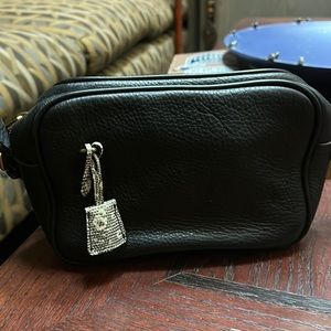 Jcrew signature purse. Black with animal print tag.
